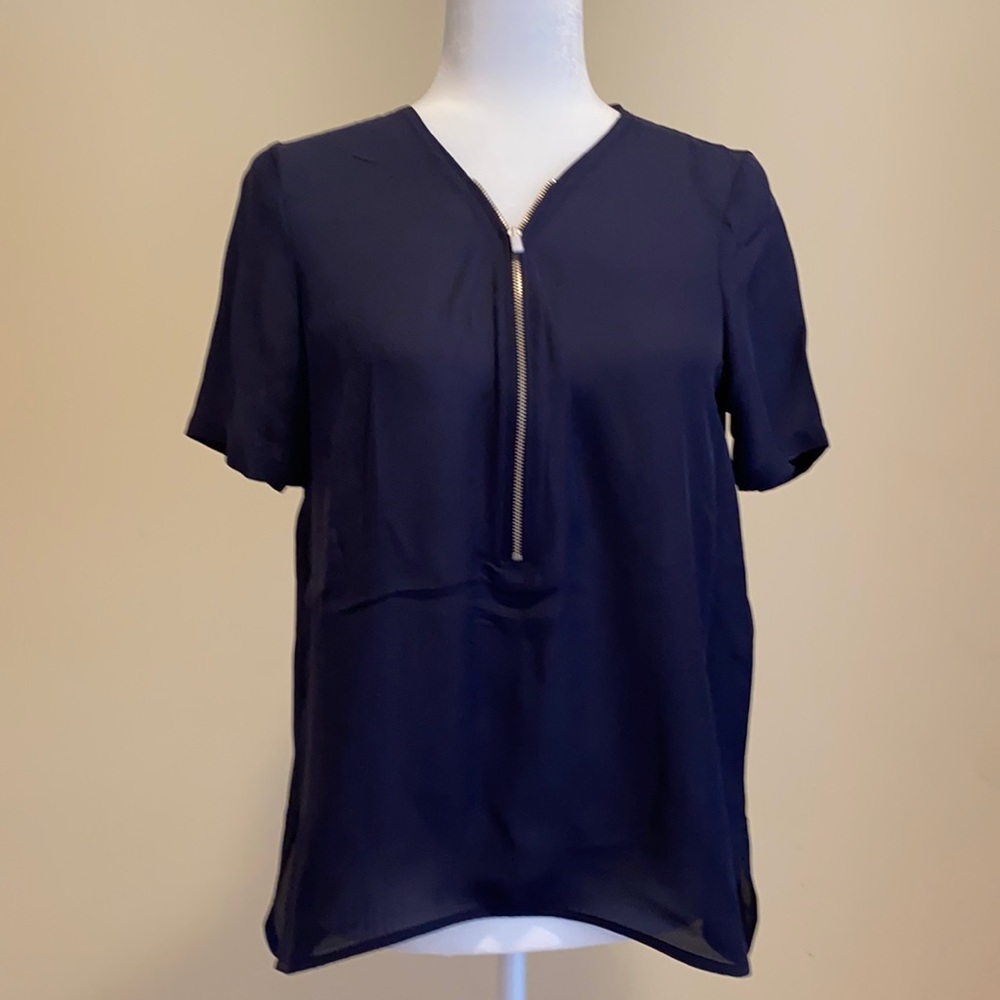 The Kooples navy short-sleeved blouse.
